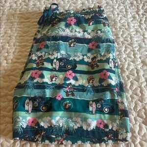 Buc-ee's Tropical Surfer Hawaiian Surfboard
Swim Shorts,